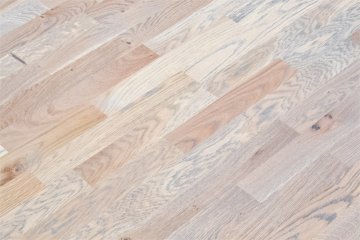 Zakázková realizace šedé dubové podlahy s povrchovou úpravou v odstínu PARKETO - IRIS